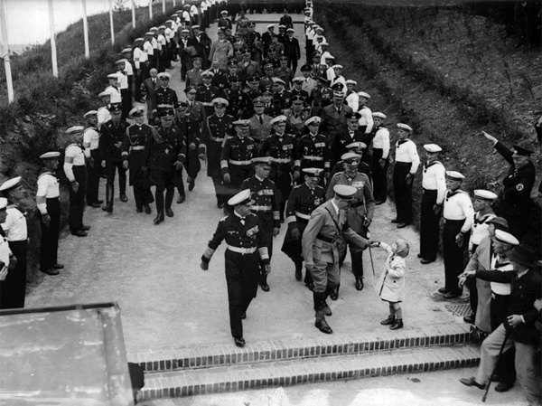 Adolf Hitler leaves the opening ceremony of the Laboe Naval Memorial